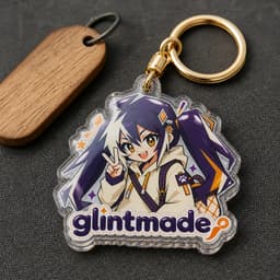 Custom epoxy acrylic keychain photographed on charcoal textile