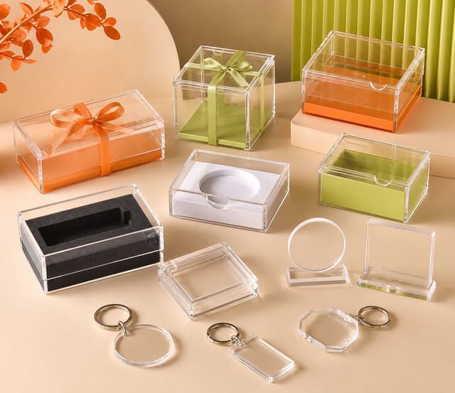 Clear acrylic gift boxes and keychain blanks prepared for protected packing