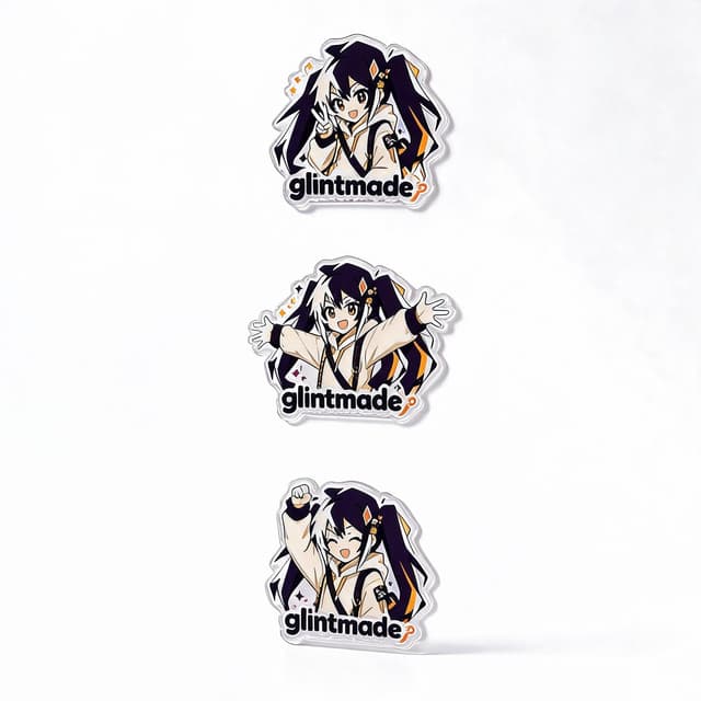 Custom clear acrylic fridge magnets with black and white character artwork on a stainless fridge door, shown at true size