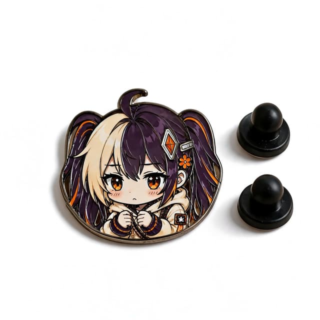 Soft enamel pin of a pink-haired chibi angel with hearts and sparkles, attached to knit fabric