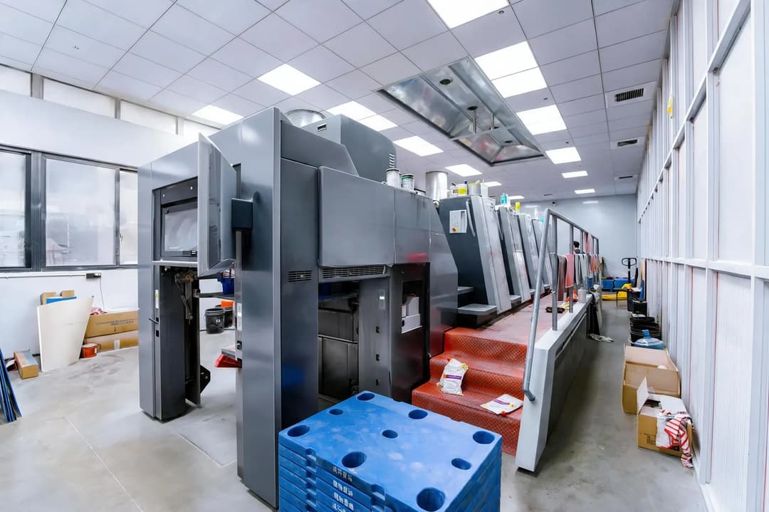 Our print shop with the multicolor offset press used for sticker and label work